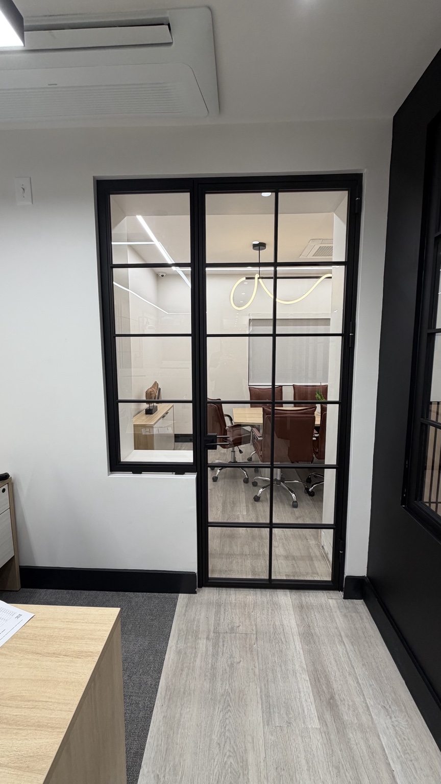 Black framed glass meeting room door